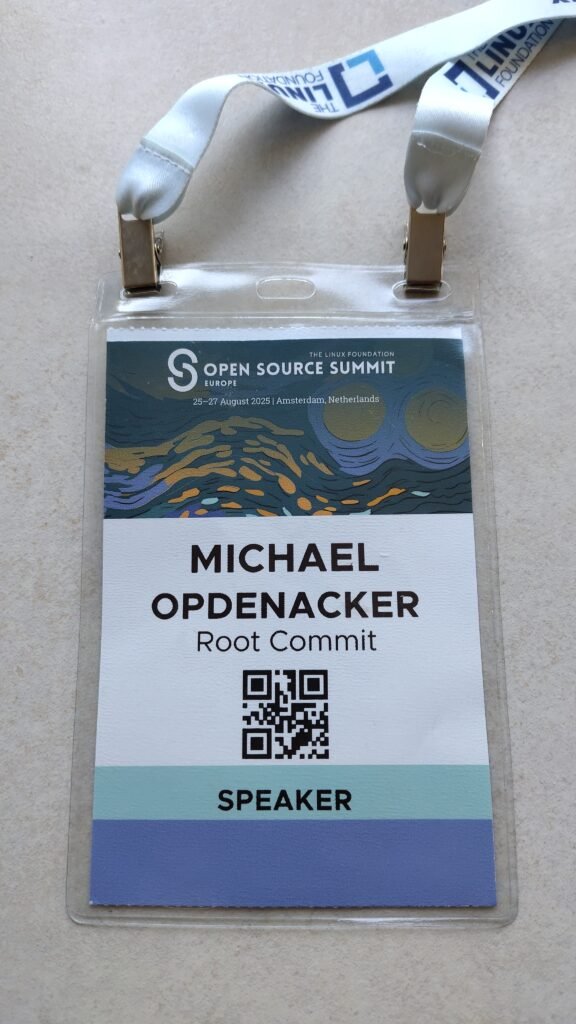 ELCE 2025 speaker badge for Michael Opdenacker, Root Commit